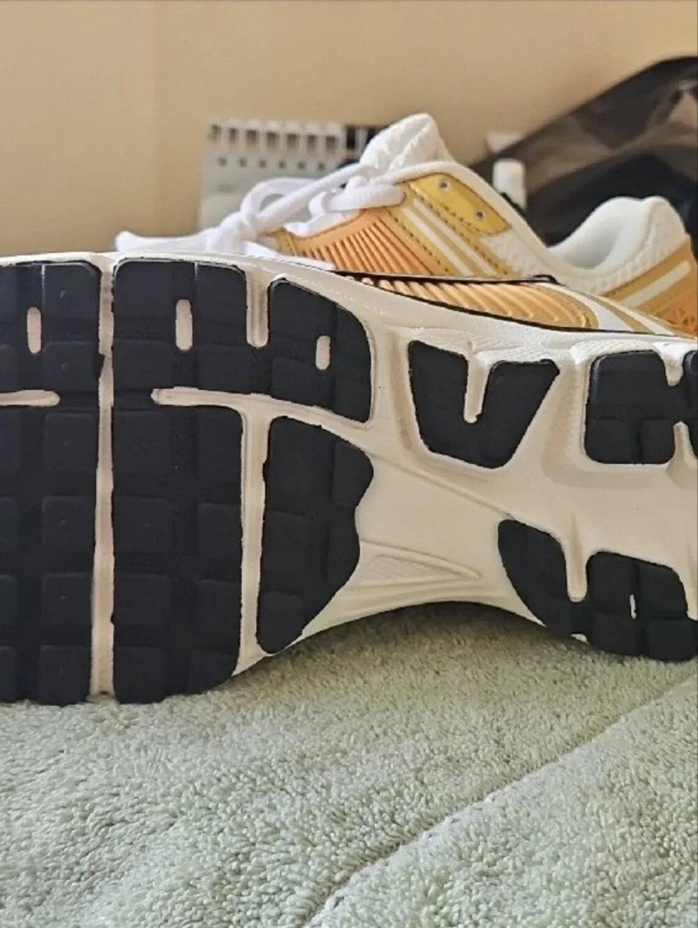 Nike Women's White and Gold Athletic Sneakers